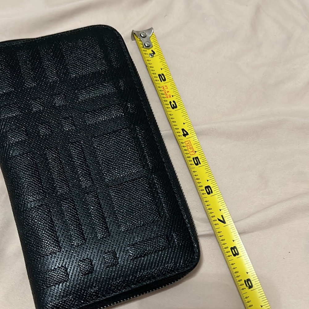 Large black leather embossed Burberry wallet, good for travel ,passports,cards !